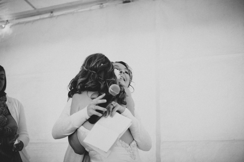 hugging bridesmaid