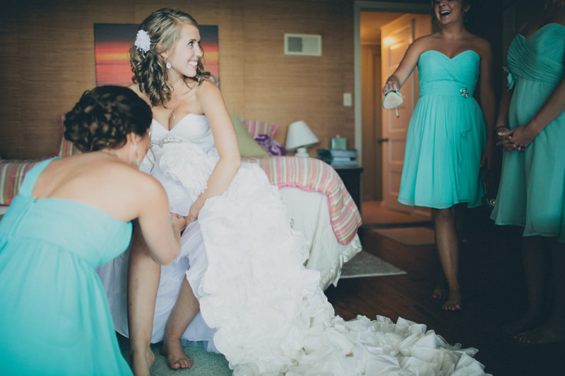 bride putting on garter