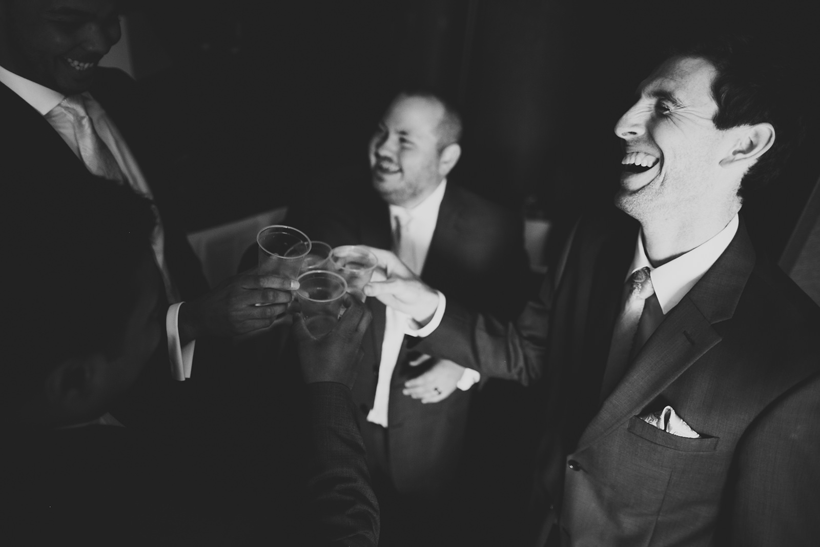 groomsmen toasting