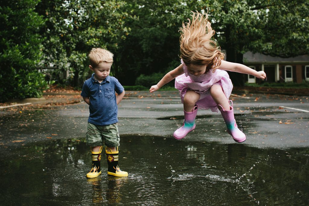 kids splashing in puddles