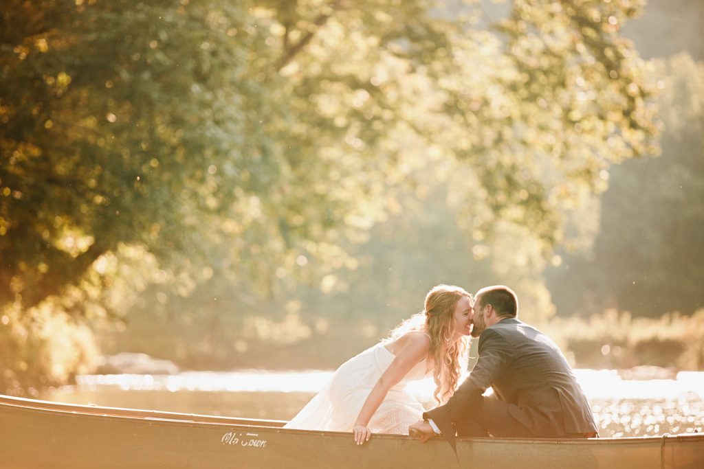 wedding photos in a canoe asheville