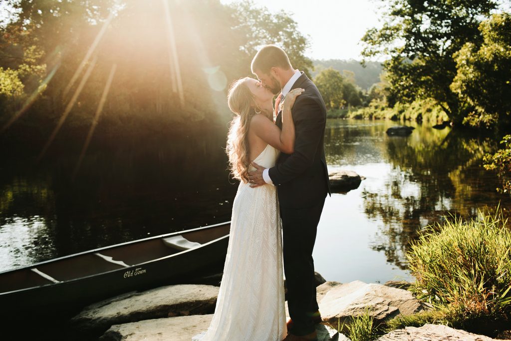 bride and groom in a canoe