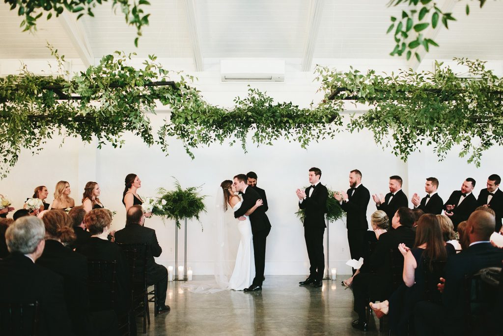 hanging ferns and greenery wedding